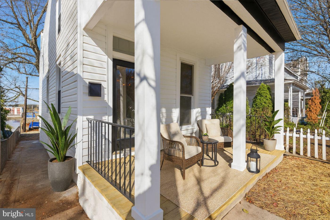 3414 Harford Road Baltimore, MD 21218 - Photo 10 of 32 a view of balcony with chairs and potted plants