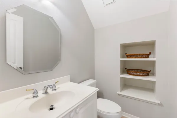 a kitchen with stainless steel appliances a refrigerator and a stove top oven