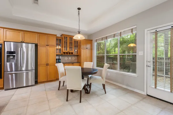 a kitchen with stainless steel appliances granite countertop a stove and a sink