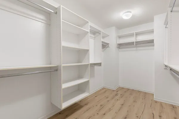 a front view of a house with sitting area