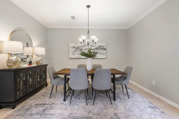 a bathroom with a sink a toilet and vanity