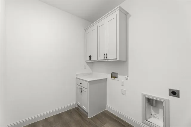 a view of cabinets with wooden floor