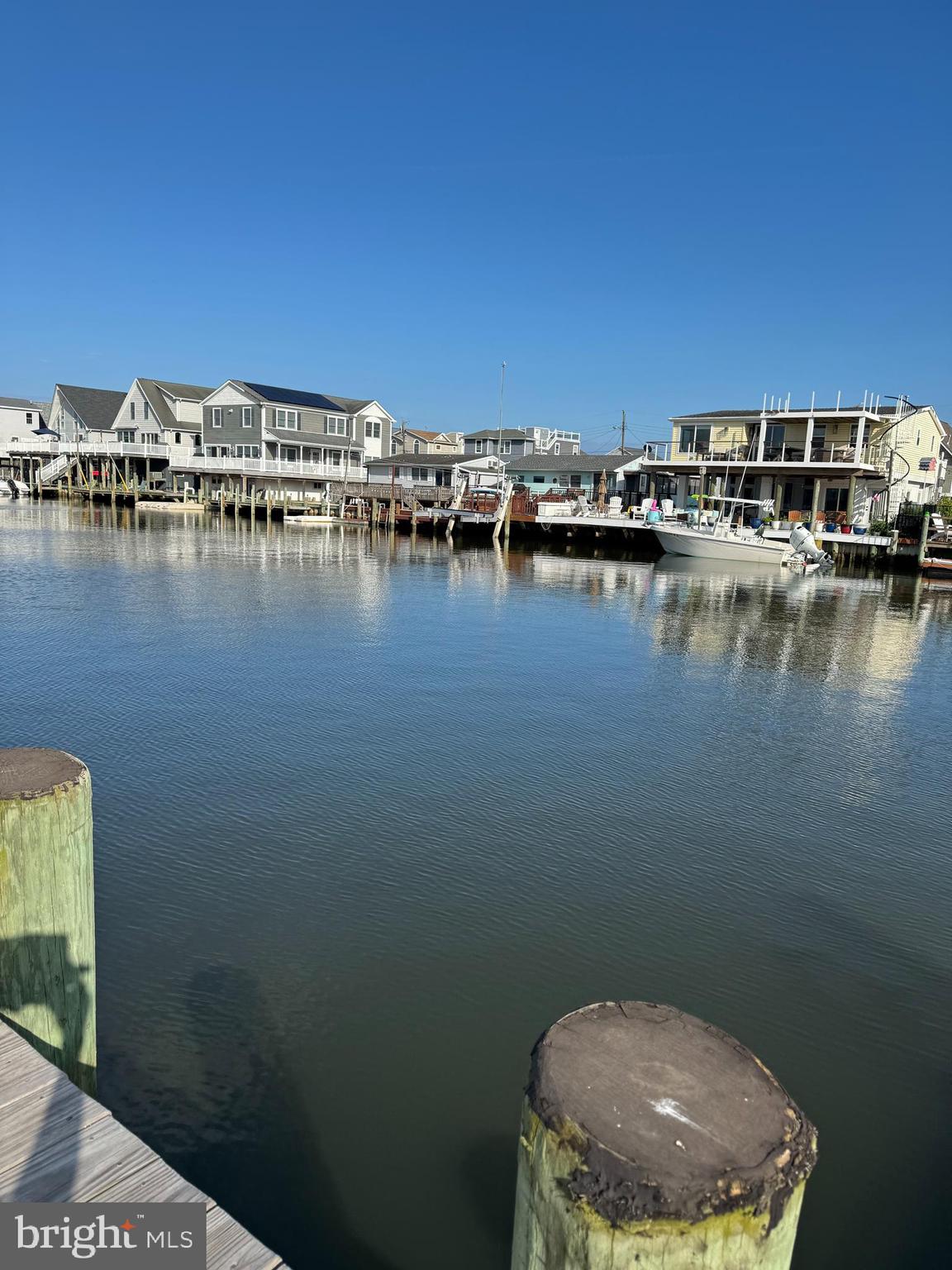 134 Flamingo Road Tuckerton, NJ 08087 - Photo 5 of 32 a view of a lake with boats