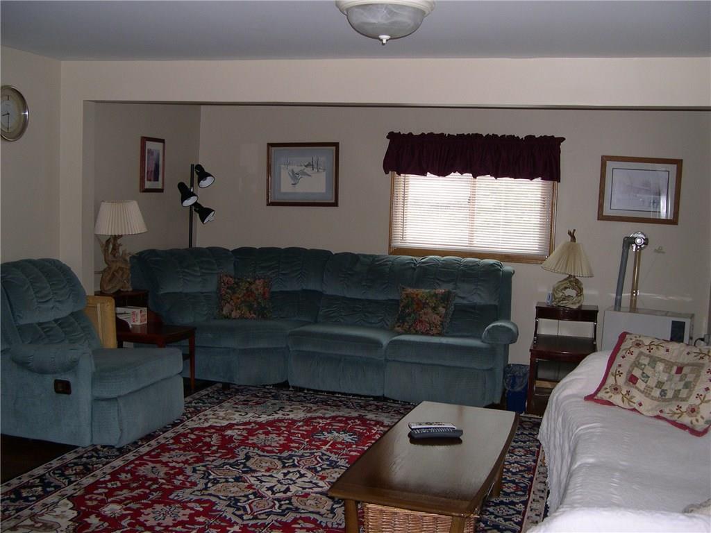 154 Wilsons Mill Road Oquossoc, ME 04964 - Photo 14 of 31 spacious living area