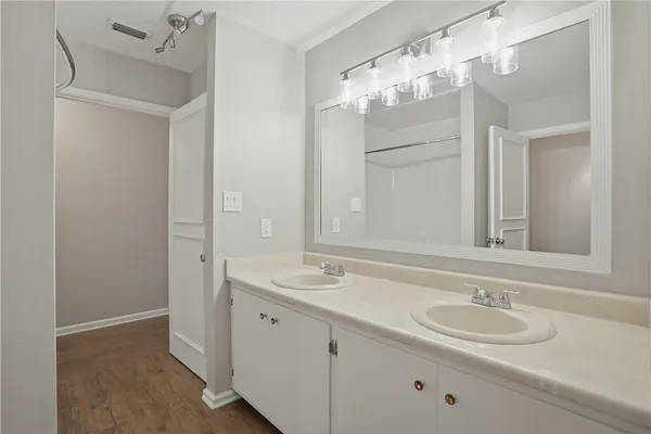 a view of storage and utility room with a window