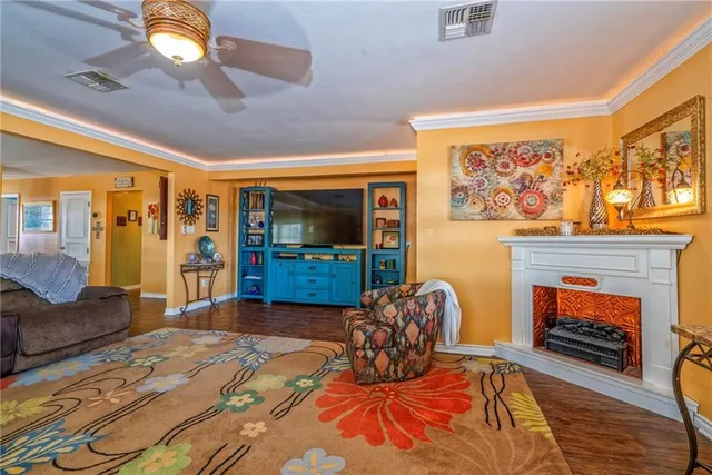 a bedroom with furniture and a fireplace
