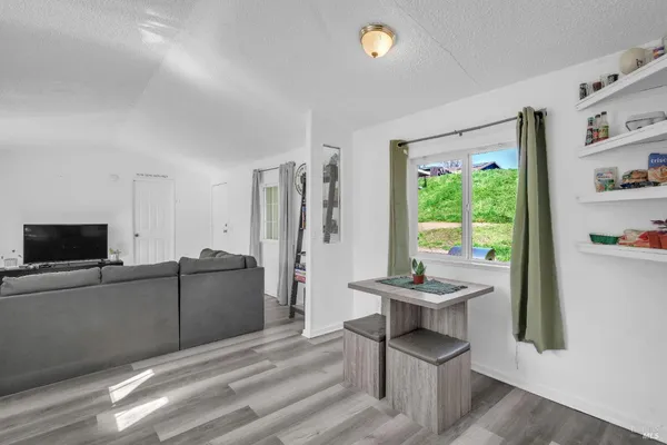 a room with furniture and a window