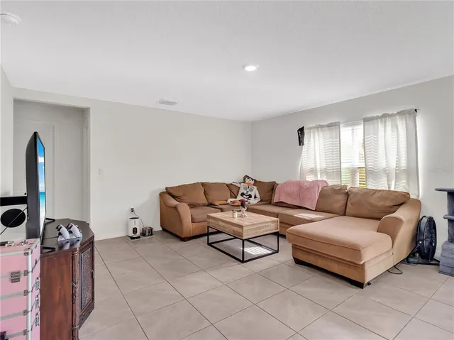 a bedroom with a bed and a cabinets