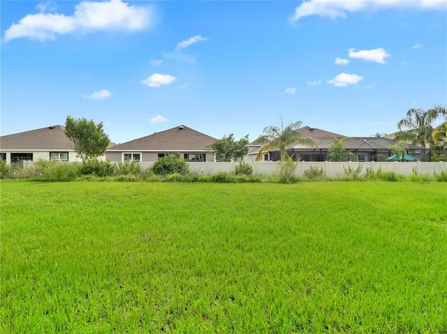 an aerial view of a house with a garden