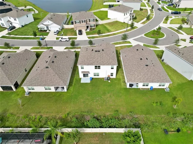 an aerial view of a building with outdoor space