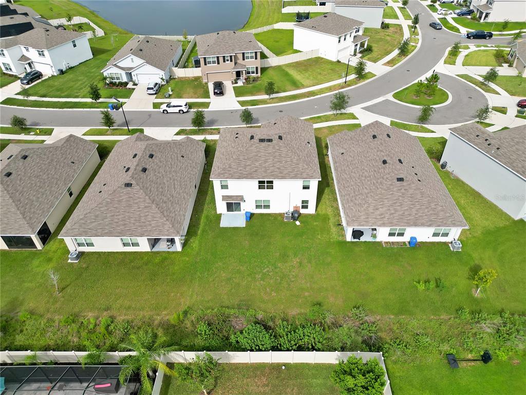 16669 Windmill Forge Pass Wimauma, FL 33598 - Photo 28 of 44 an aerial view of a house with a garden