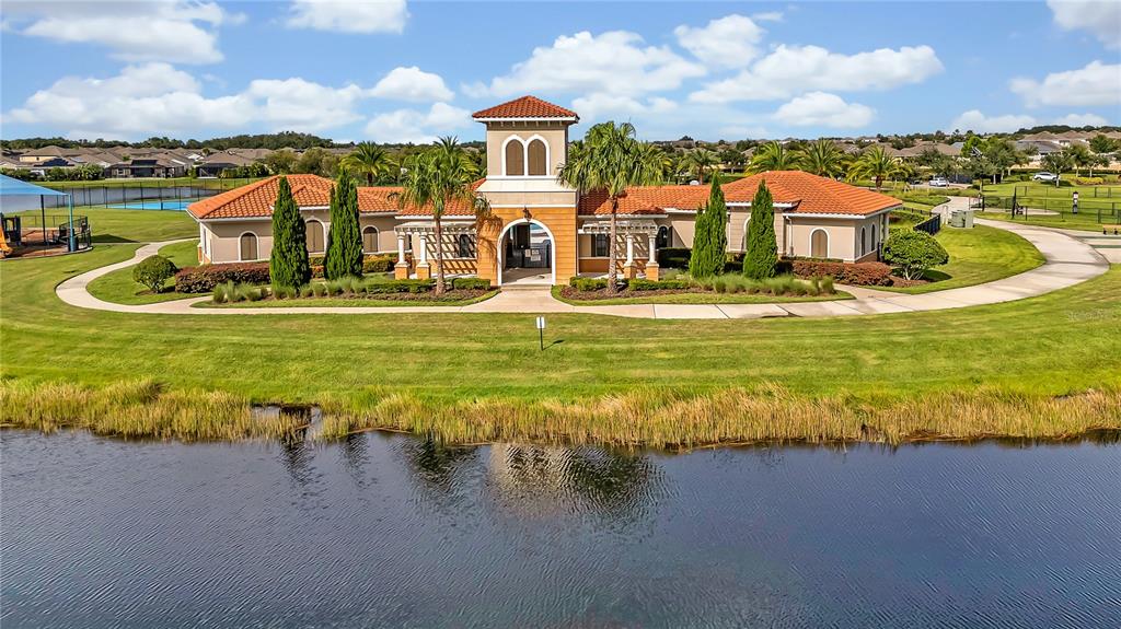 16669 Windmill Forge Pass Wimauma, FL 33598 - Photo 32 of 44 a view of a house with a ocean view