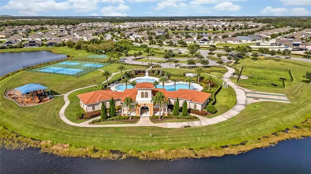 a view of a lake with a building in the background