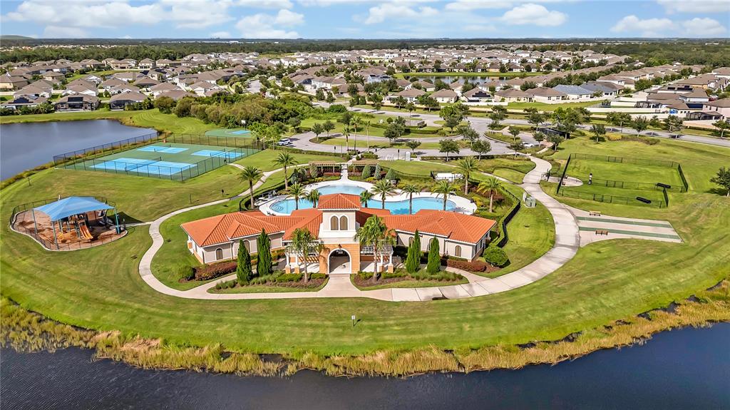 16669 Windmill Forge Pass Wimauma, FL 33598 - Photo 39 of 44 an aerial view of a house with a ocean view
