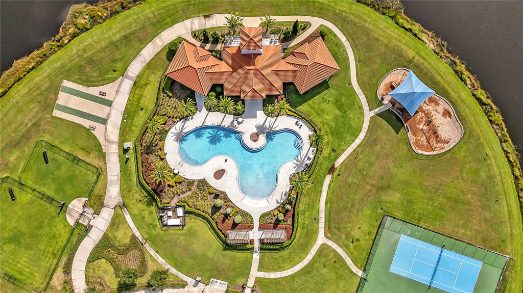 16669 Windmill Forge Pass Wimauma, FL 33598 - Photo 40 of 44 an aerial view of a swimming pool