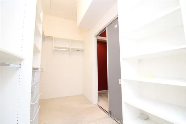 a view of a house with backyard and porch