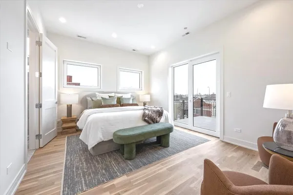 a bed room with a bed and a couch