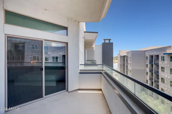 a view of a building from a balcony