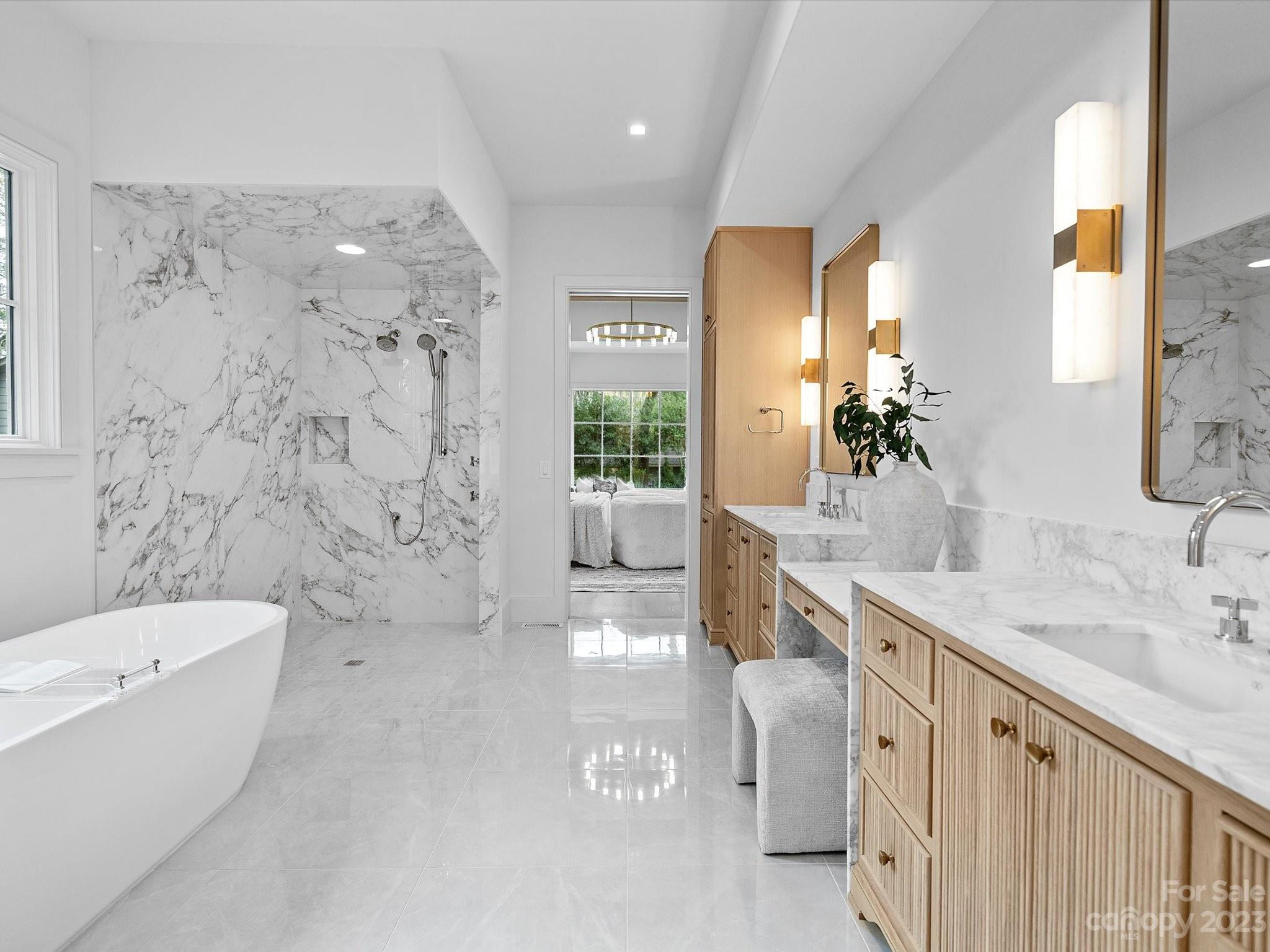 3272 Foxcroft Road Charlotte, NC 28211 - Photo 18 of 42 a bathroom with a double vanity sink toilet and shower