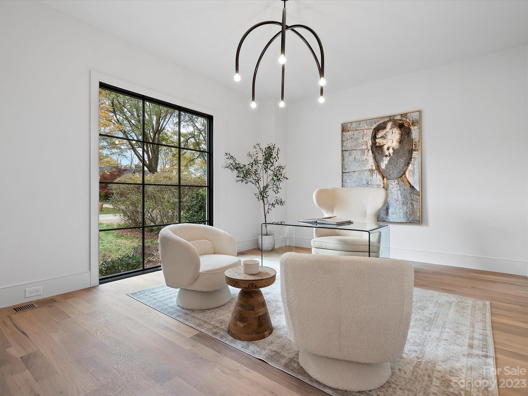 3272 Foxcroft Road Charlotte, NC 28211 - Photo 21 of 42 a living room with furniture and a window