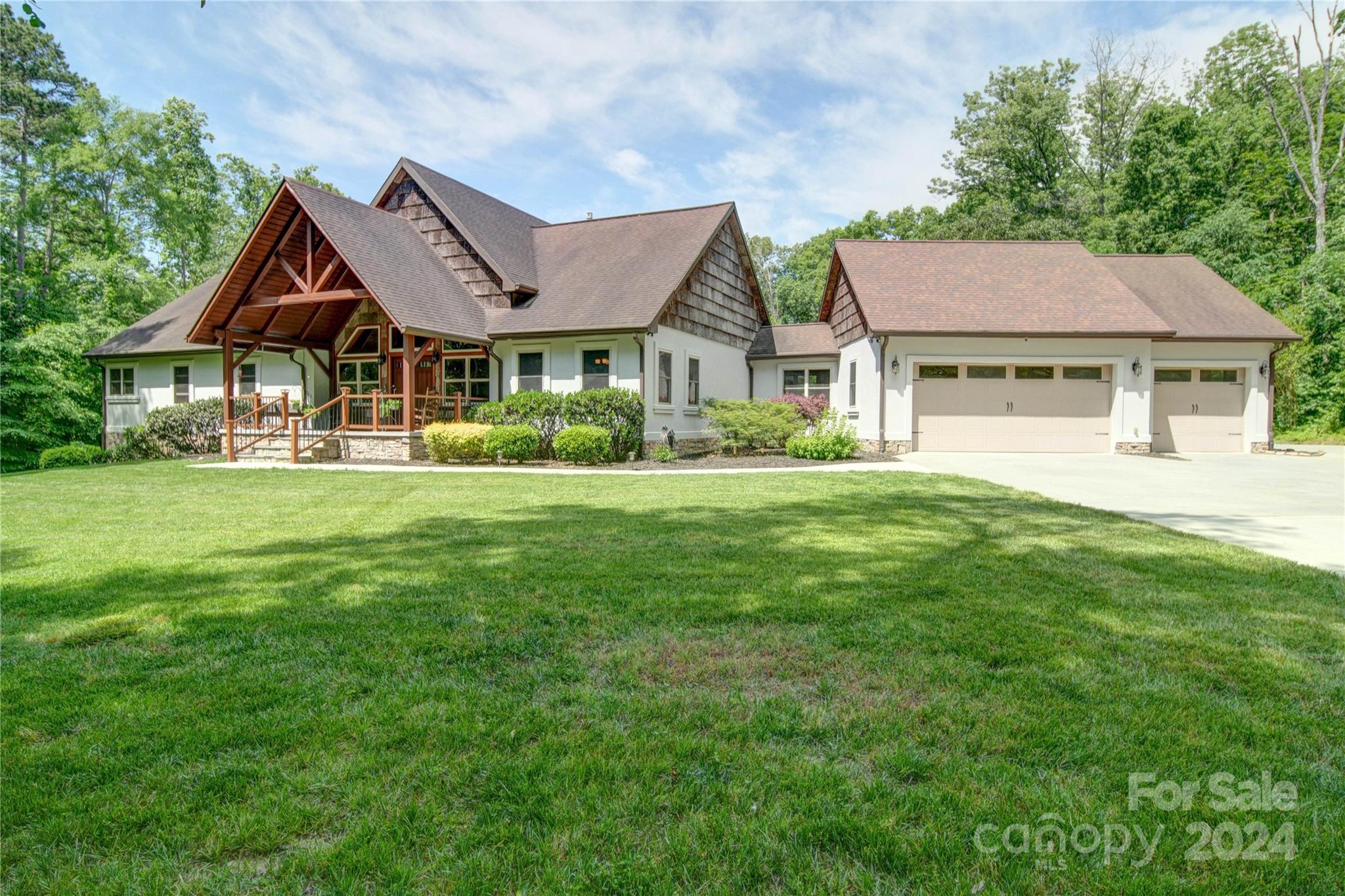 1220 Bridges Acres Road Kannapolis, NC 28083 - Photo 1 of 46 a front view of a house with a garden