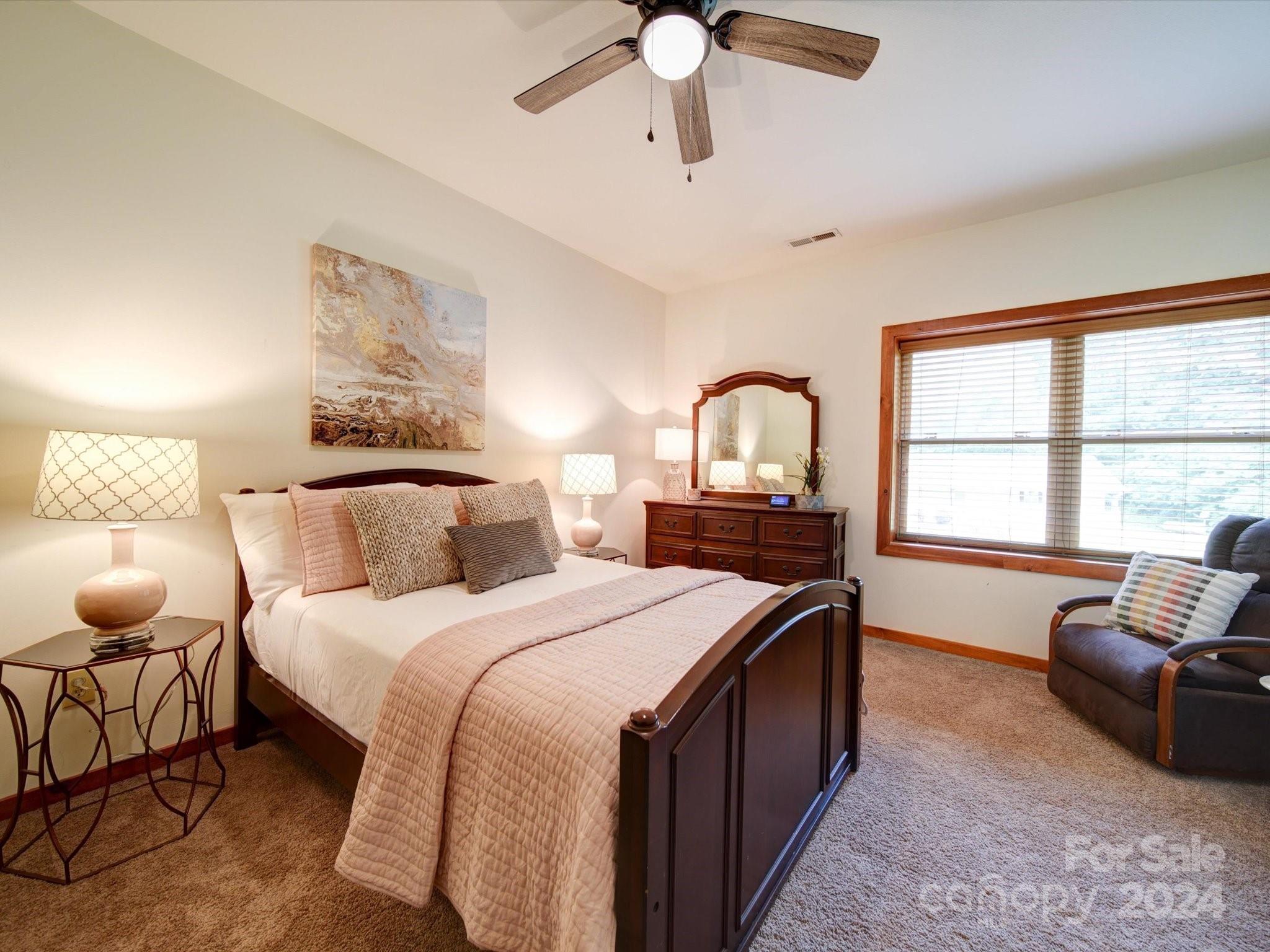 1220 Bridges Acres Road Kannapolis, NC 28083 - Photo 12 of 46 a bedroom with a bed couch and window