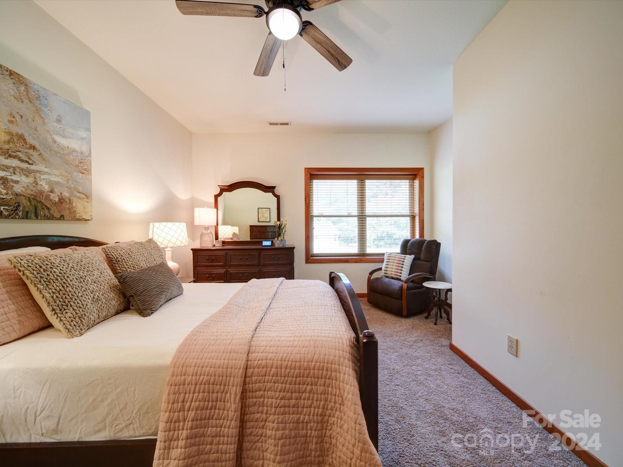 1220 Bridges Acres Road Kannapolis, NC 28083 - Photo 13 of 46 a bedroom with a bed and a large window