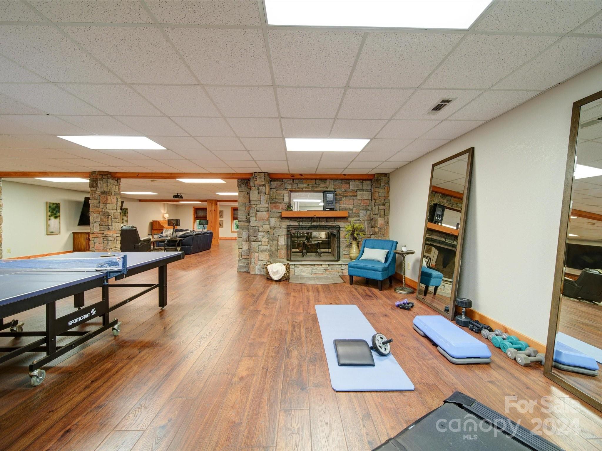 1220 Bridges Acres Road Kannapolis, NC 28083 - Photo 15 of 46 a living room with furniture and a flat screen tv