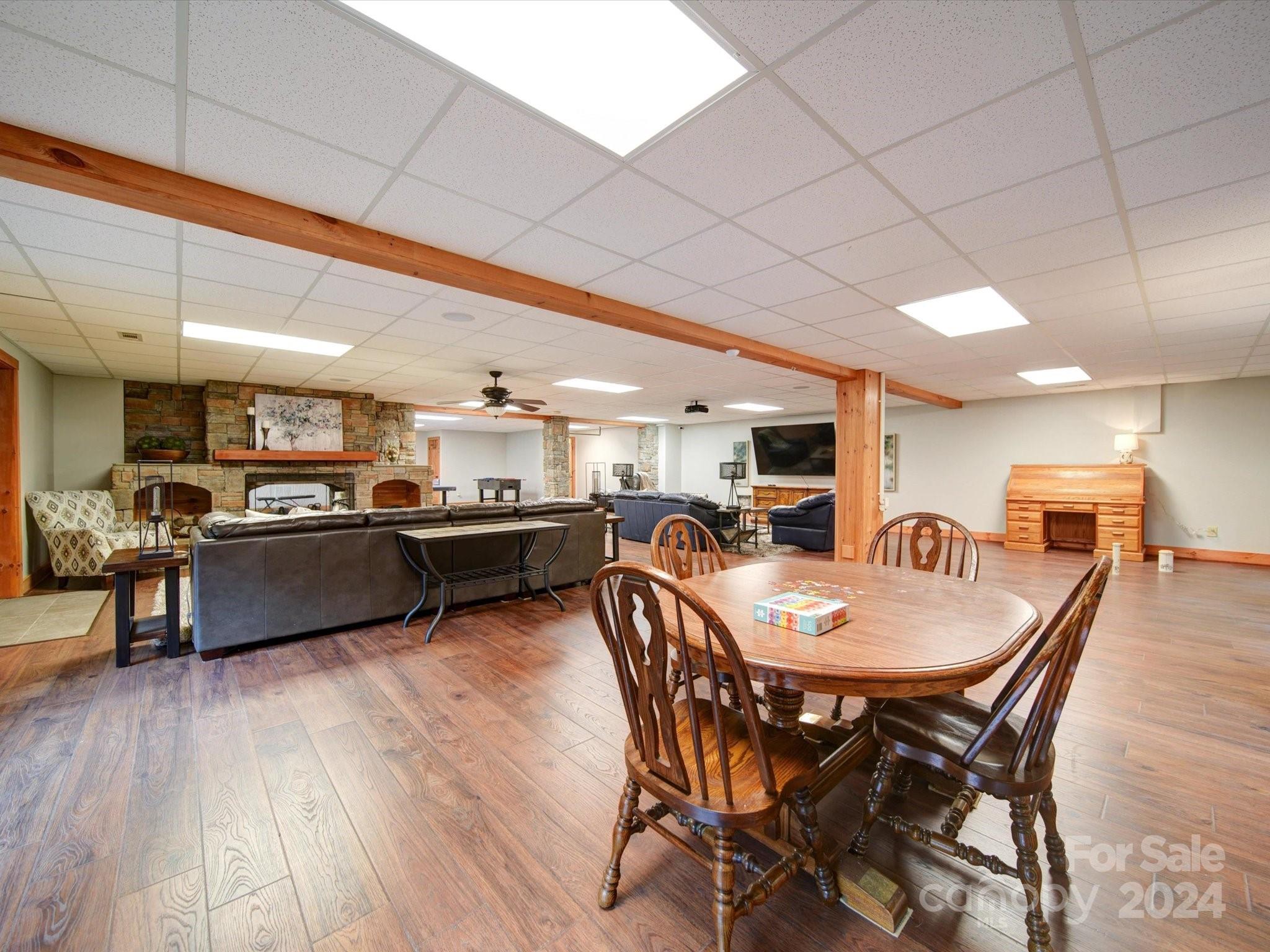 1220 Bridges Acres Road Kannapolis, NC 28083 - Photo 19 of 46 a view of a dining room with furniture and wooden floor