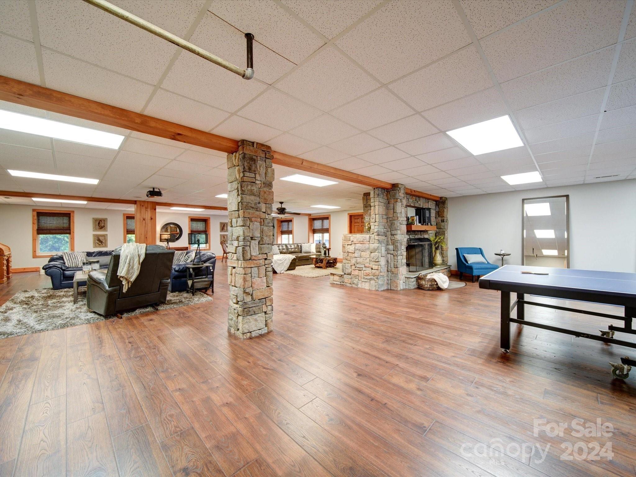 1220 Bridges Acres Road Kannapolis, NC 28083 - Photo 20 of 46 a living room with furniture and a wooden floor