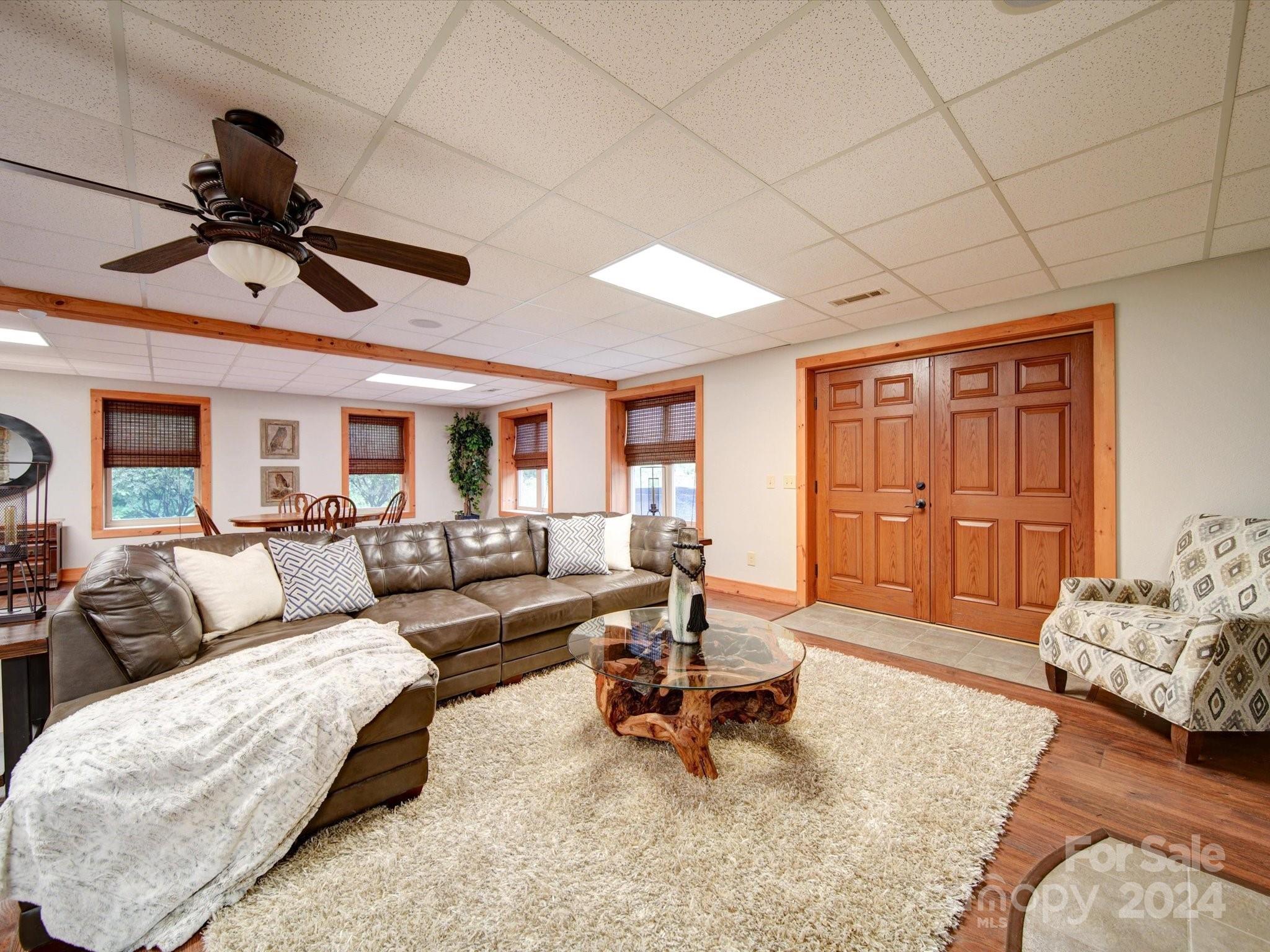 1220 Bridges Acres Road Kannapolis, NC 28083 - Photo 21 of 46 a living room with furniture and a large window
