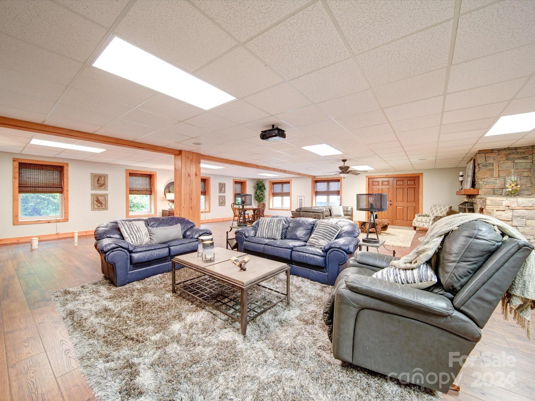 1220 Bridges Acres Road Kannapolis, NC 28083 - Photo 23 of 46 a living room with furniture and a large window