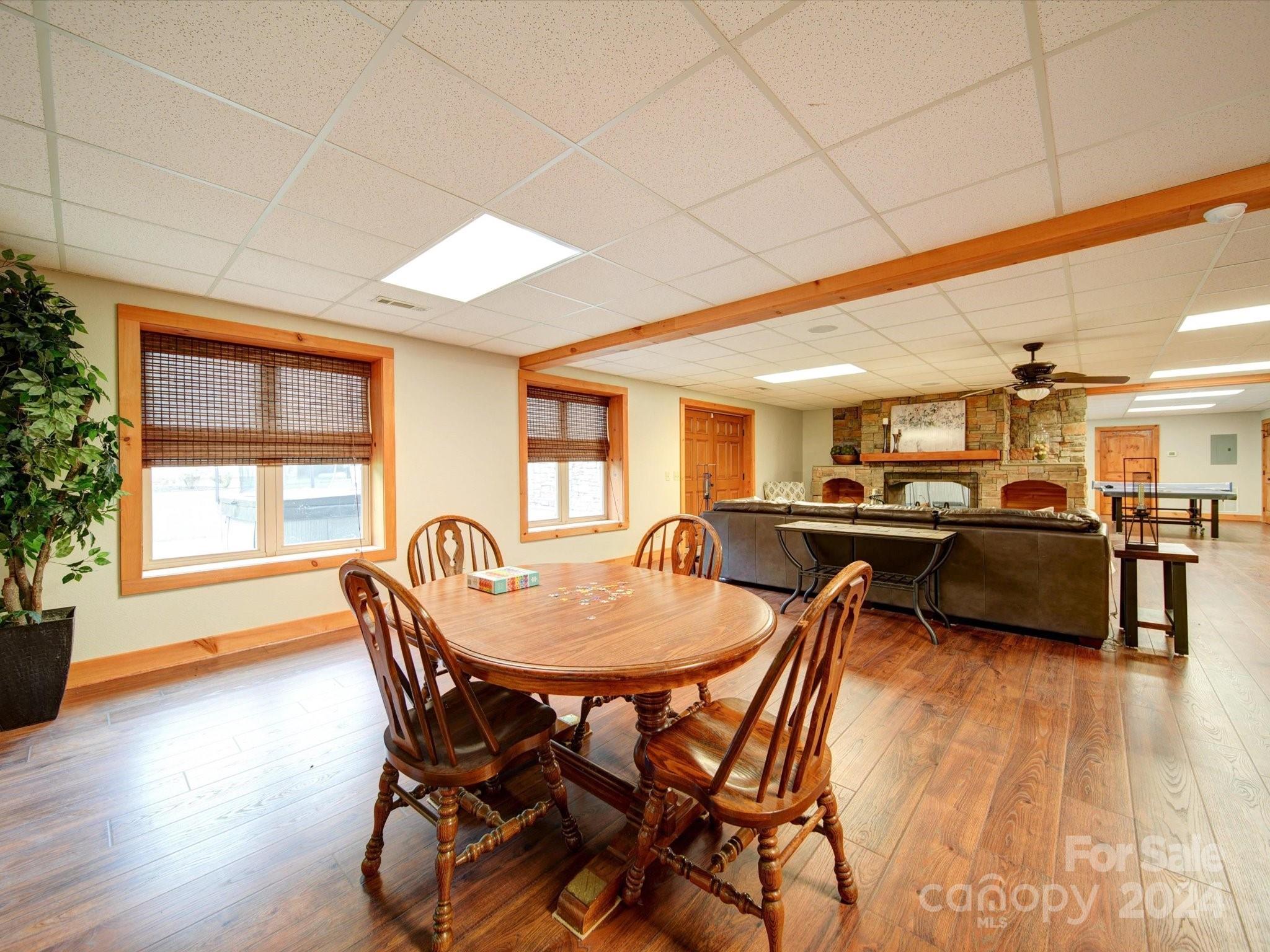 1220 Bridges Acres Road Kannapolis, NC 28083 - Photo 24 of 46 a dining room with furniture and wooden floor