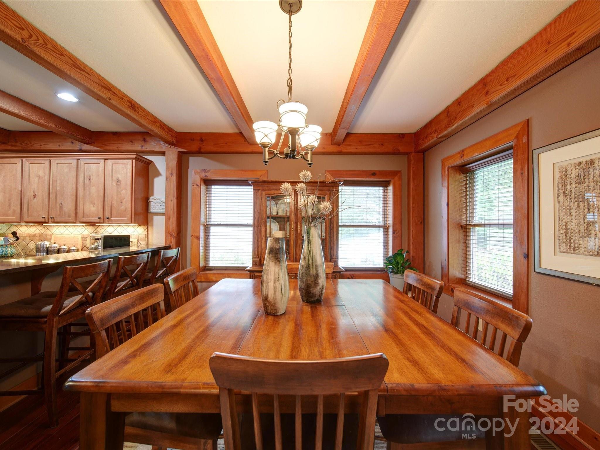 1220 Bridges Acres Road Kannapolis, NC 28083 - Photo 25 of 46 a view of a dining room with furniture and wooden floor
