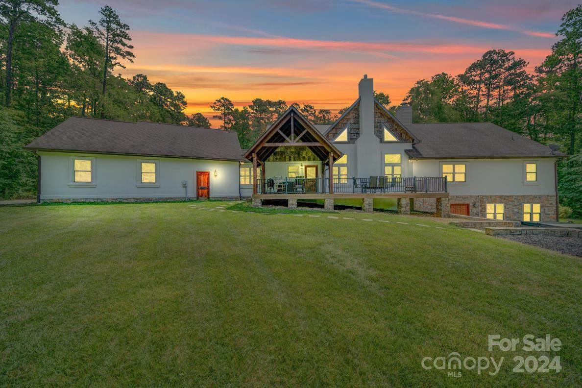 1220 Bridges Acres Road Kannapolis, NC 28083 - Photo 27 of 46 a front view of a house with a garden