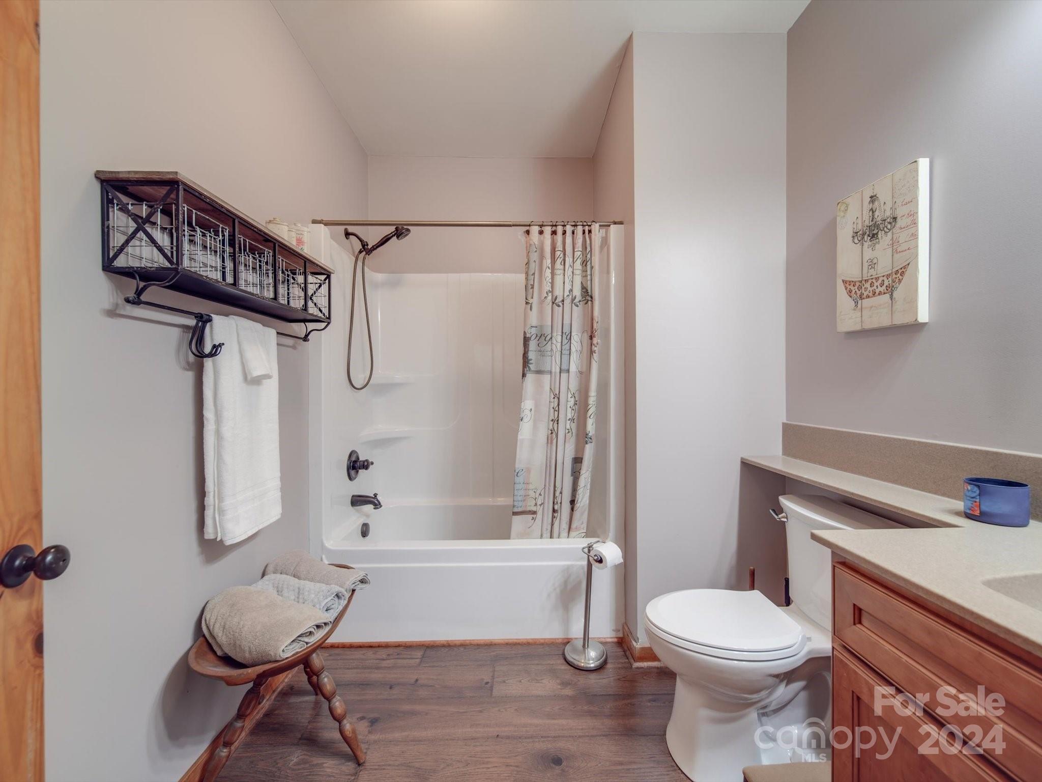 1220 Bridges Acres Road Kannapolis, NC 28083 - Photo 30 of 46 a bathroom with a toilet a sink and bathtub