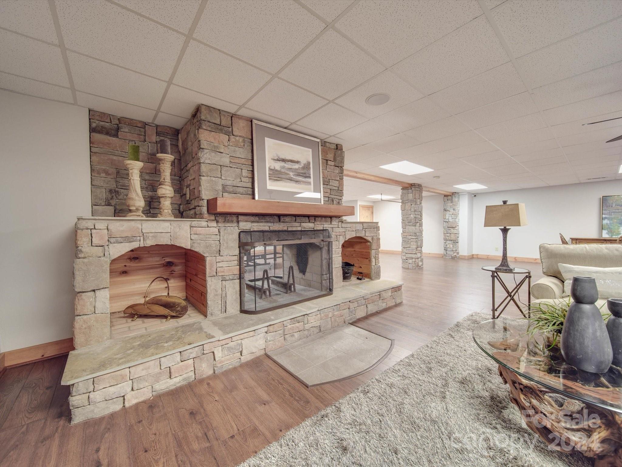 1220 Bridges Acres Road Kannapolis, NC 28083 - Photo 35 of 46 a living room with furniture and a fireplace