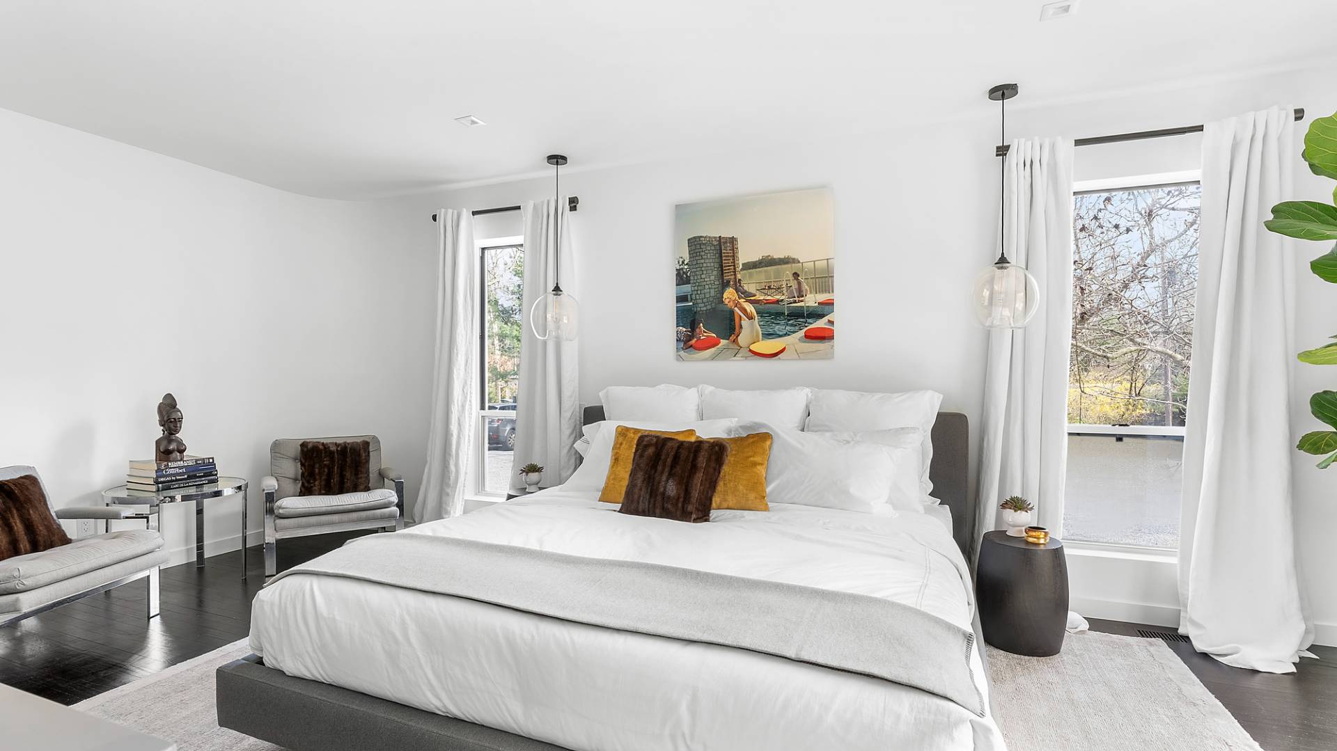 8 Patriots Lane East Hampton, NY 11937 - Photo 11 of 23 a bedroom with a large bed and a window