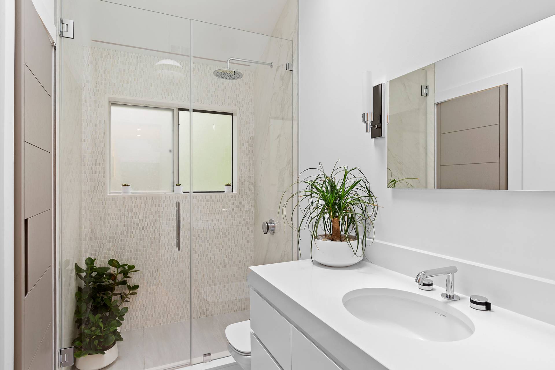 8 Patriots Lane East Hampton, NY 11937 - Photo 14 of 23 a bathroom with a sink a toilet and shower