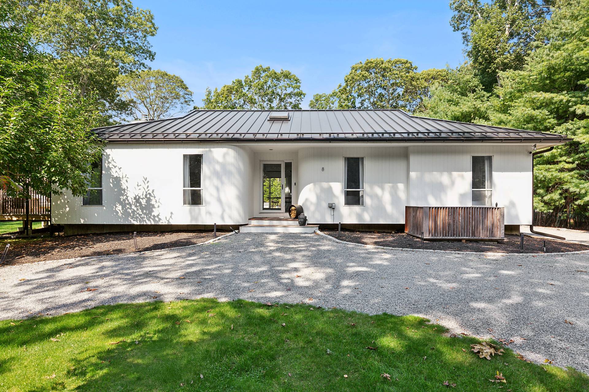 8 Patriots Lane East Hampton, NY 11937 - Photo 3 of 23 a view of a house with backyard