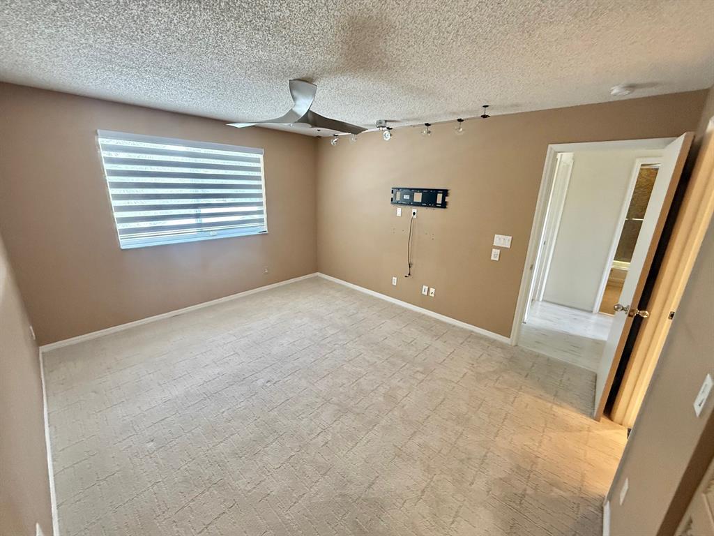 1654 Southwest 109th Terrace Davie, FL 33324 - Photo 15 of 24 a view of an empty room with a window