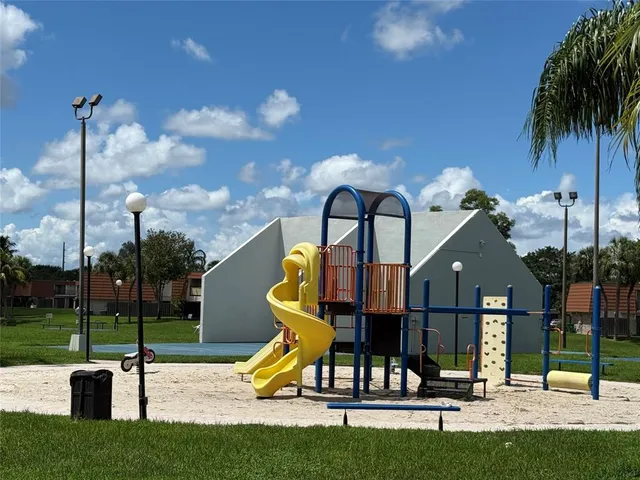 a view of a park with slide