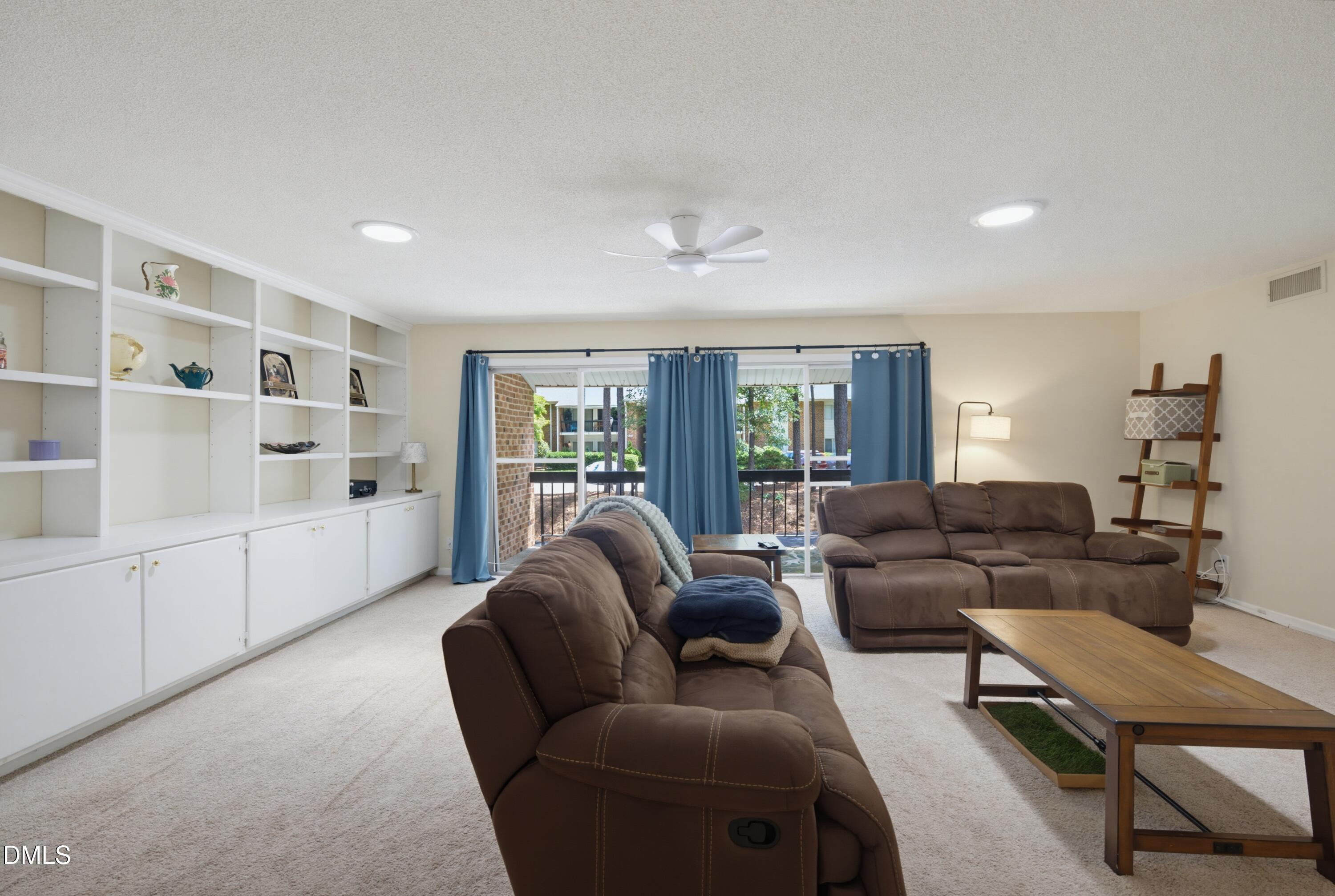 4709 Edwards Mill Road, Unit E Raleigh, NC 27612 - Photo 3 of 25 Family Room