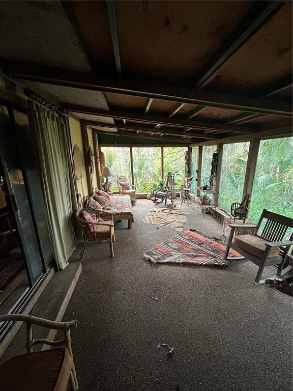 10679 Goose Prairie Road Leesburg, FL 34788 - Photo 23 of 30 a view of a room with gym equipment