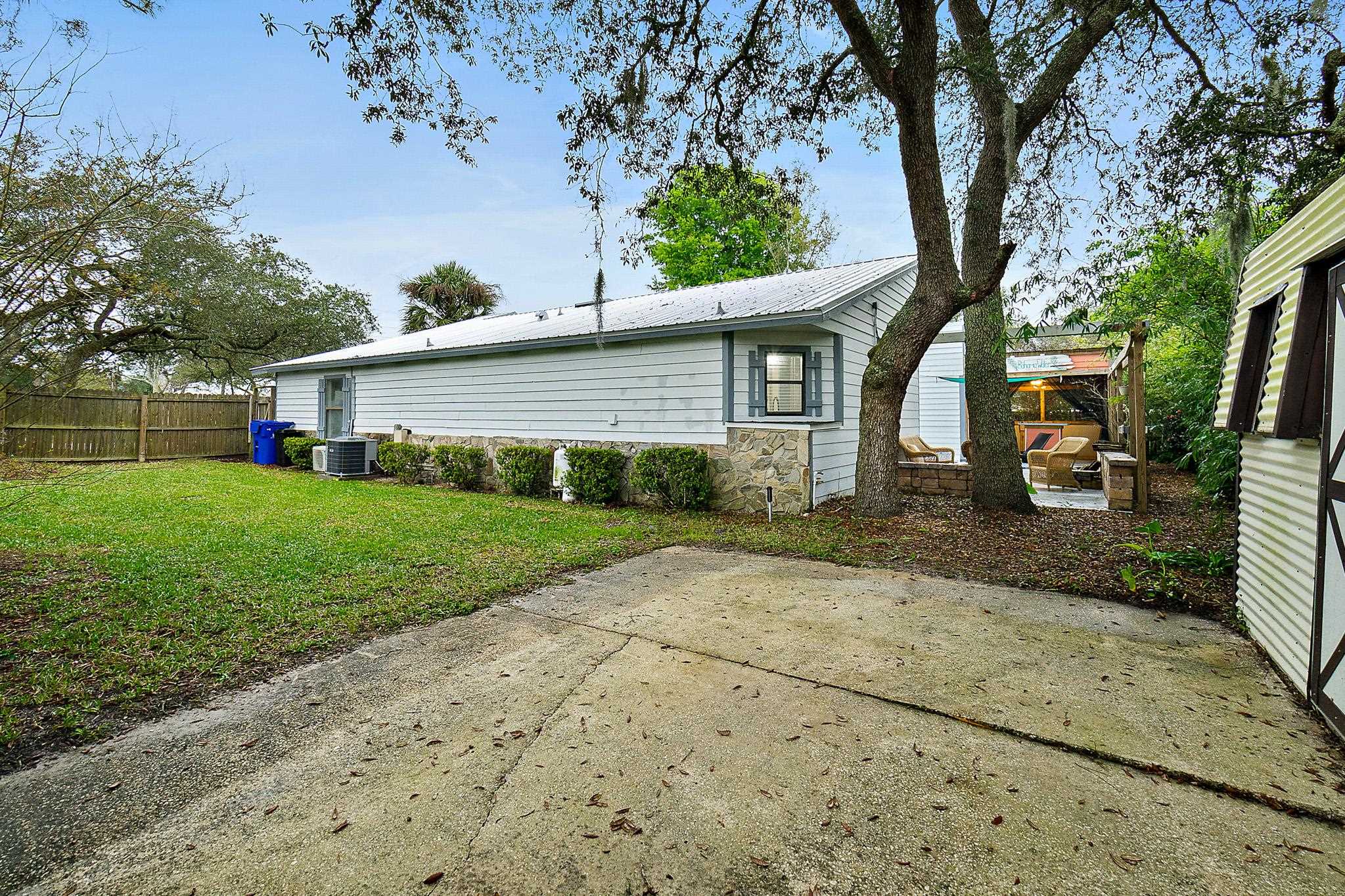 133 Gentian Road St. Augustine, FL 32086 - Photo 38 of 40 a front view of house with yard and green space