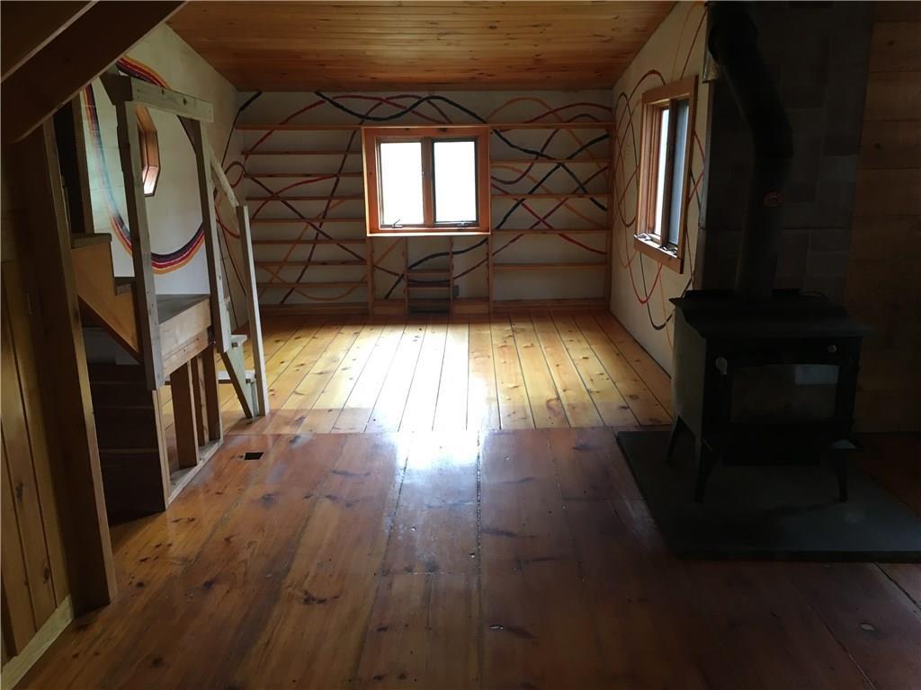 209 Browns Point Road Bowdoinham, ME 04008 - Photo 4 of 8 Large front to back living room with...