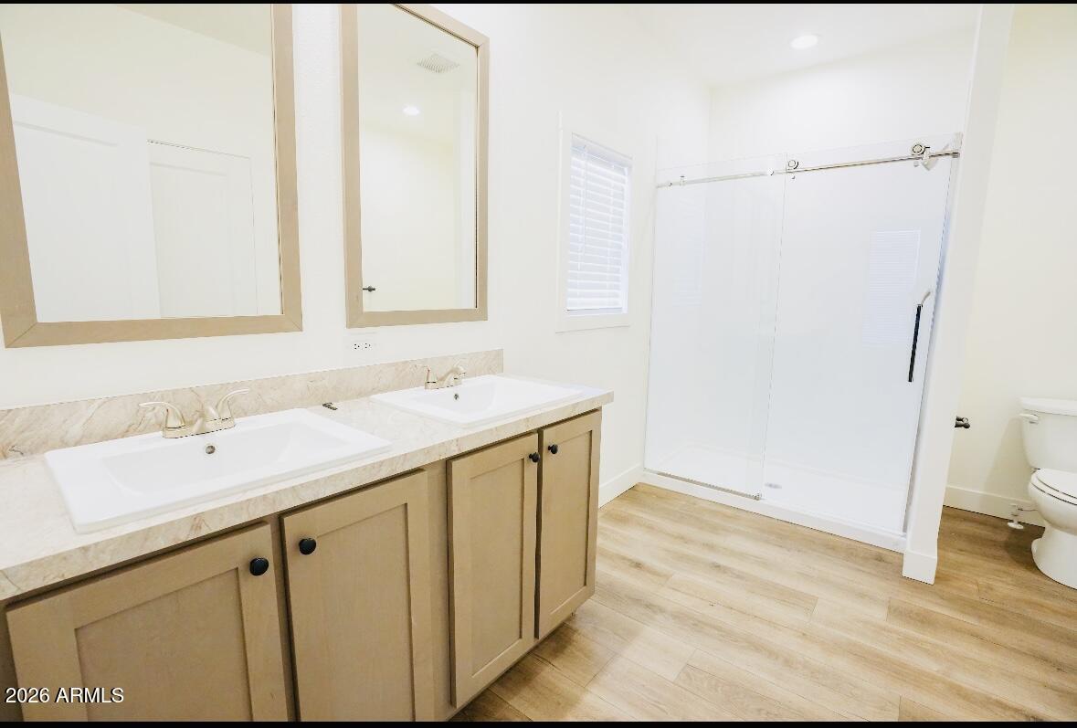 4710 Lazy Lariat Lane Rimrock, AZ 86335 - Photo 13 of 19 a bathroom with a sink a toilet and a mirror
