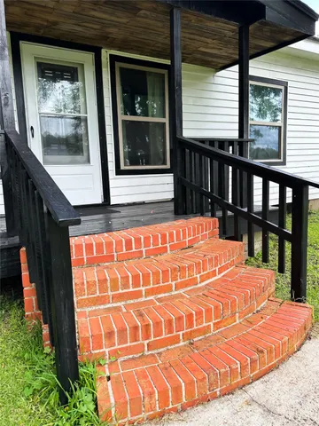 a bed sitting in a balcony