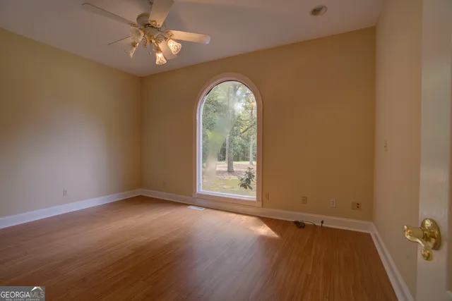 a view of empty room with a window