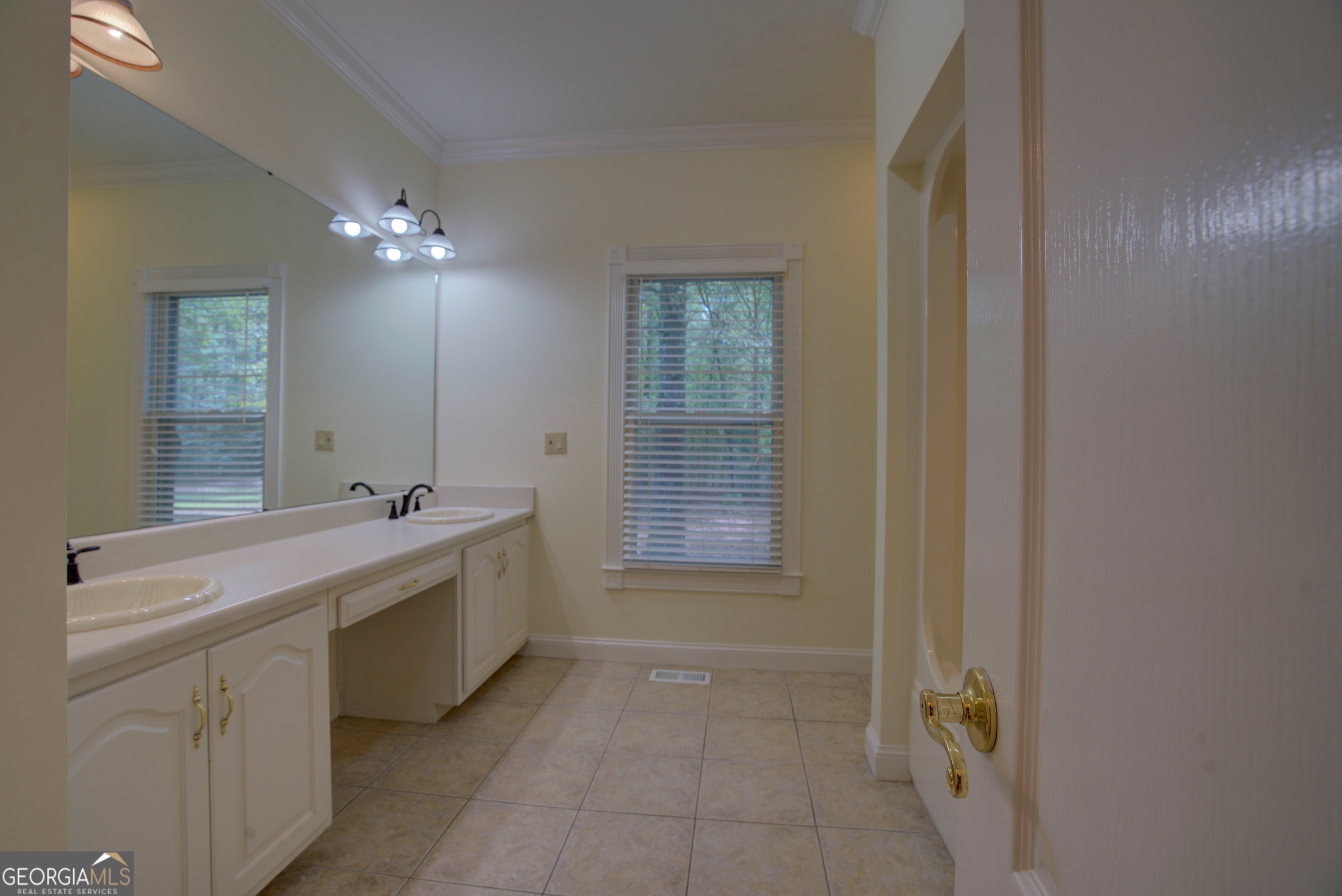 2011 Bailey Road Aragon, GA 30104 - Photo 25 of 66 a bathroom with a bathtub sink vanity and mirror
